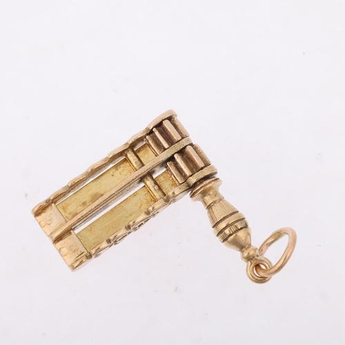 1346 - A late 20th century 9ct gold novelty World Cup football rattle clacker charm/pendant, maker GJ Ltd, ... 