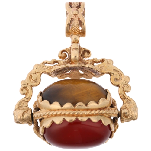 1353 - A late 20th century 9ct gold hardstone swivel fob, 30.9mm, 8g