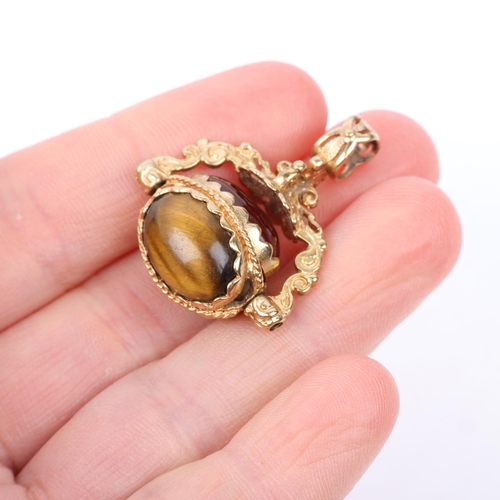 1353 - A late 20th century 9ct gold hardstone swivel fob, 30.9mm, 8g