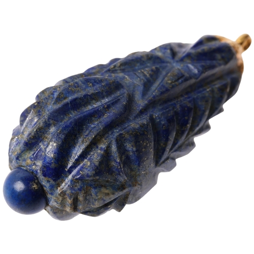 1371 - A large Ethnic carved lapis lazuli idol head teardrop pendant, with unmarked yellow metal mount, 69.... 