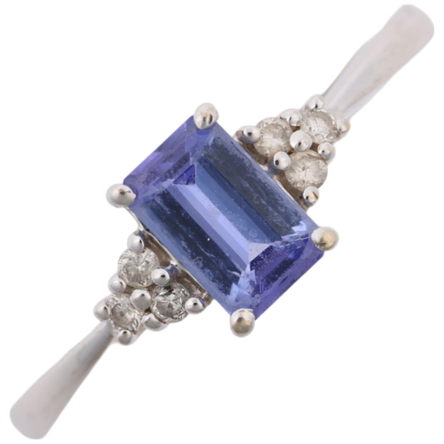 1372 - A modern 18ct white gold tanzanite and diamond dress ring, setting height 6.4mm, size M, 1.6g