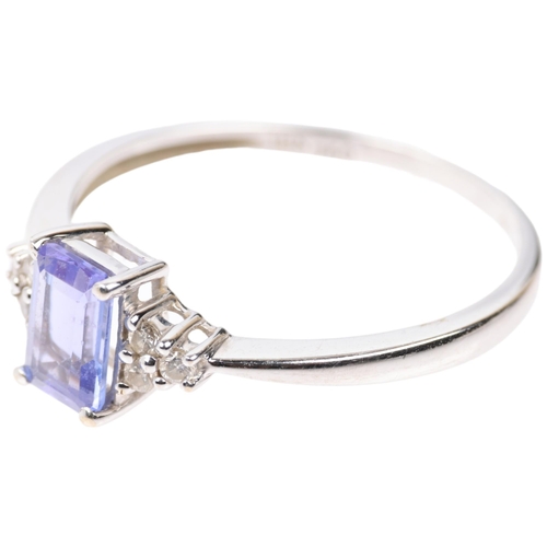 1372 - A modern 18ct white gold tanzanite and diamond dress ring, setting height 6.4mm, size M, 1.6g