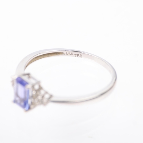 1372 - A modern 18ct white gold tanzanite and diamond dress ring, setting height 6.4mm, size M, 1.6g