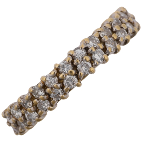 1376 - A late 20th century 18ct gold diamond double-row half eternity ring, maker VJ, import London 1986, s... 