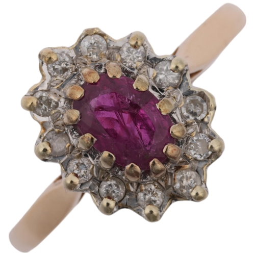 1377 - A late 20th century 9ct gold ruby and diamond oval cluster ring, maker MM Ltd, London 1983, setting ... 