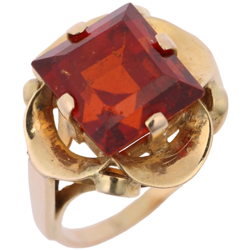 1378 - A late 20th century hessonite garnet dress ring, claw set with 9ct rectangular step-cut garnet, appa... 