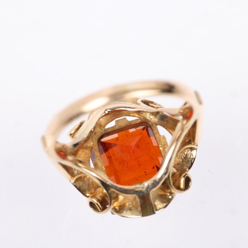 1378 - A late 20th century hessonite garnet dress ring, claw set with 9ct rectangular step-cut garnet, appa... 