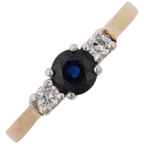 1379 - A 9ct gold three stone sapphire and diamond ring, setting height 4.7mm, size M, 2.1g