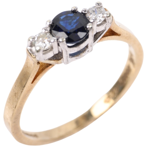 1379 - A 9ct gold three stone sapphire and diamond ring, setting height 4.7mm, size M, 2.1g