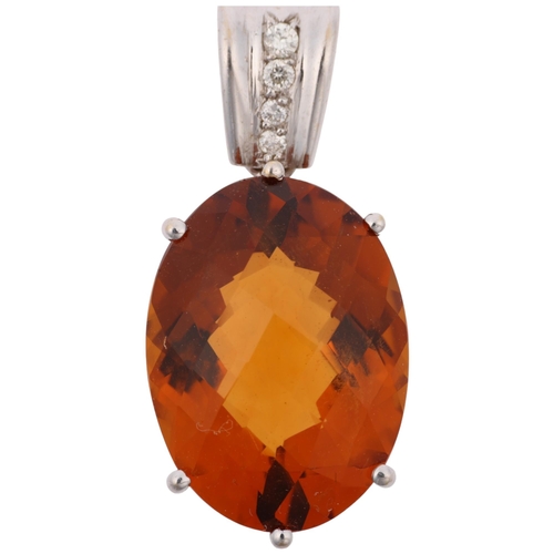 1380 - A modern 18ct white gold citrine and diamond drop pendant, set with oval rose-cut citrine and modern... 