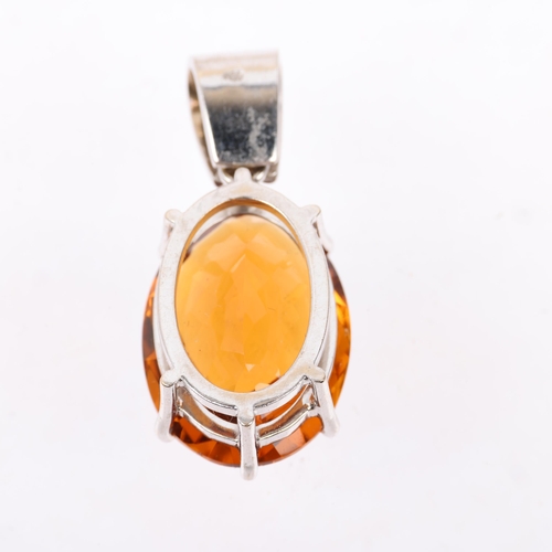 1380 - A modern 18ct white gold citrine and diamond drop pendant, set with oval rose-cut citrine and modern... 