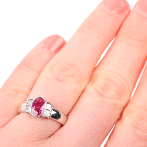 1384 - A modern 18ct white gold pink sapphire and diamond dress ring, rub-over set with 0.7ct oval mixed-cu... 