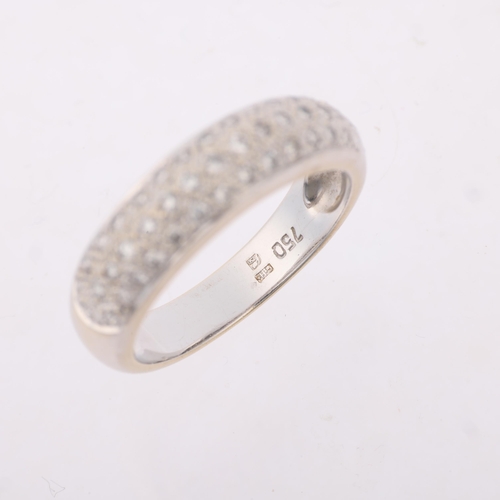 1386 - A modern 18ct white gold pave diamond band ring, set with modern round brilliant-cut diamonds, total... 