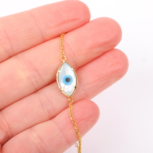 1390 - A modern 14ct gold mother-of-pearl evil eye bracelet, 16.5cm, 1.1g