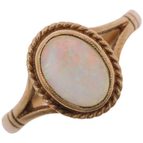 1392 - A late 20th century 9ct gold opal dress ring, maker S&S, Birmingham 1995, rub-over set with oval cab... 