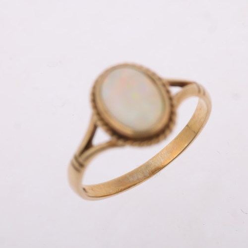 1392 - A late 20th century 9ct gold opal dress ring, maker S&S, Birmingham 1995, rub-over set with oval cab... 