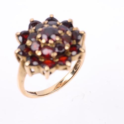 1401 - A mid-20th century 9ct gold garnet flowerhead cluster ring, maker H&S, London 1963, setting height 1... 