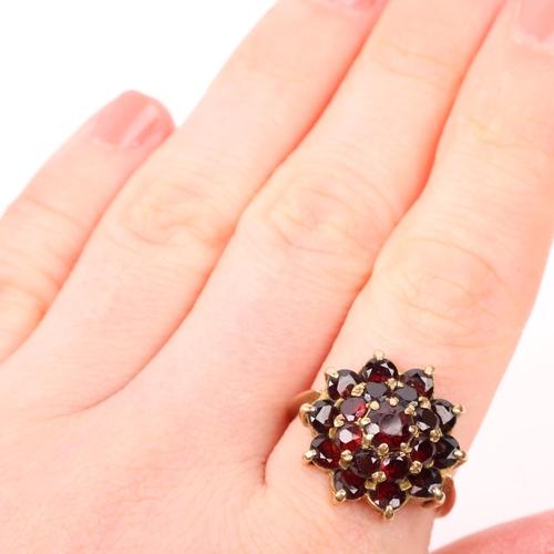 1401 - A mid-20th century 9ct gold garnet flowerhead cluster ring, maker H&S, London 1963, setting height 1... 