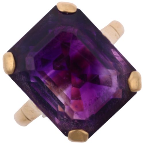 1402 - A mid-20th century 9ct gold amethyst dress ring, claw set with emerald step-cut amethyst, setting he... 