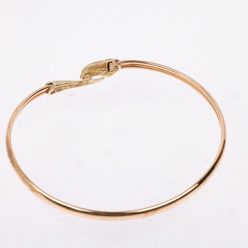 1406 - A late 20th century 9ct gold dolphin torque bangle, maker CJ Ltd, Birmingham 1993, band width 3.6mm,... 