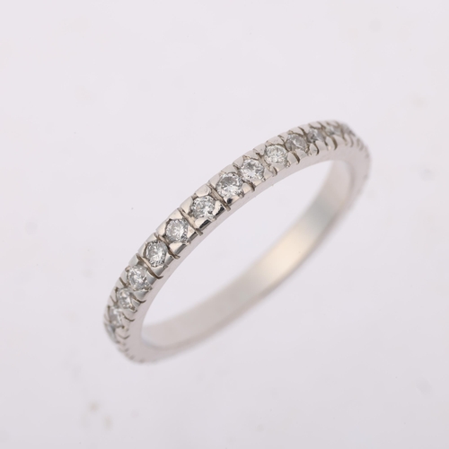 1408 - A modern platinum diamond full eternity ring, set with modern round brilliant-cut diamonds, total di... 