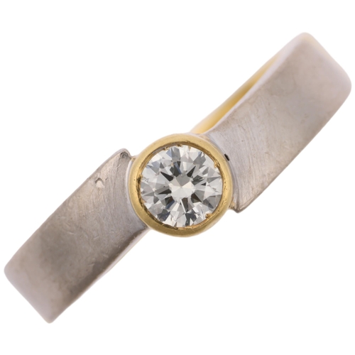 1409 - A Continental 18ct two-colour gold 0.25ct solitaire diamond ring, setting height 6.3mm, size L, 5.7g