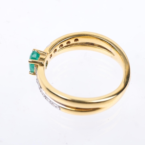 1410 - An 18ct gold emerald and diamond crossover ring, maker M&M, Birmingham 2007, set with oval mixed-cut... 