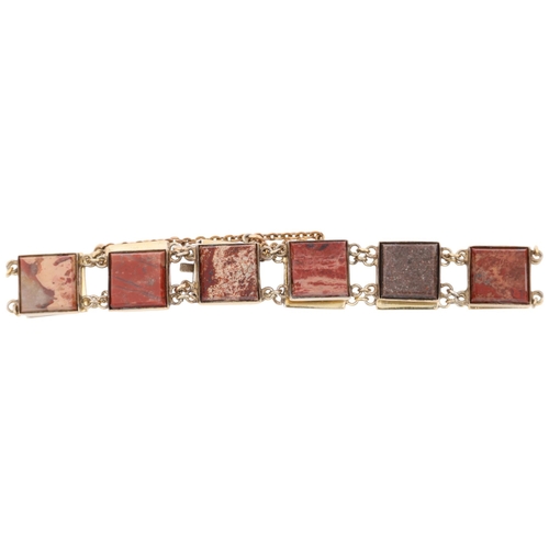 1431 - A Russian silver-gilt jasper panel bracelet, each panel set with polished square step-cut jasper, ba... 