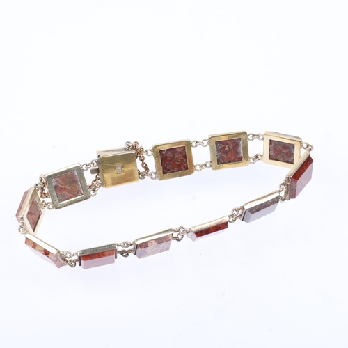 1431 - A Russian silver-gilt jasper panel bracelet, each panel set with polished square step-cut jasper, ba... 