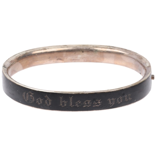 1445 - A Victorian French silver and black enamel 'God bless you' hinged mourning bangle, band width 9.2mm,... 