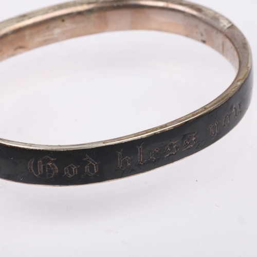 1445 - A Victorian French silver and black enamel 'God bless you' hinged mourning bangle, band width 9.2mm,... 