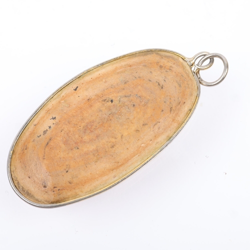 1447 - A fish fossil panel pendant, in white metal wire frame, 50.7mm, 5.5g