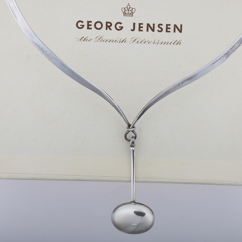 1458 - GEORG JENSEN - a Danish modernist sterling silver plain form pendant neck torque, designed by Vivian... 