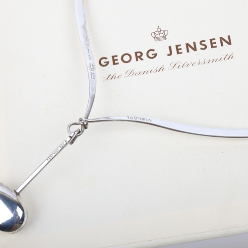 1458 - GEORG JENSEN - a Danish modernist sterling silver plain form pendant neck torque, designed by Vivian... 