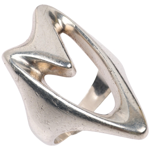 1460 - GEORG JENSEN - a Danish modernist sterling silver abstract openwork ring, designed by Henning Koppel... 