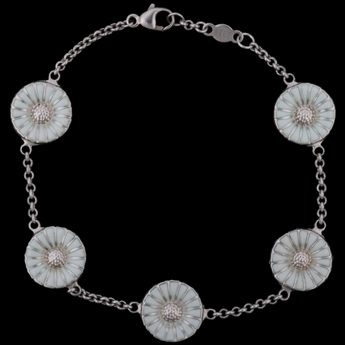 1471 - GEORG JENSEN - a modern Danish sterling silver and white enamel daisy pattern bracelet, designed by ... 