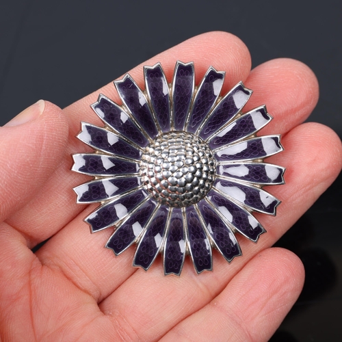 1474 - GEORG JENSEN - a modern Danish sterling silver and purple enamel daisy pattern pendant/brooch, desig... 