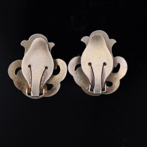 1477 - A DRAGSTED - a pair of Danish silver-gilt white enamel 'Monster Beskyttet' clip-on earrings, 21.7mm,... 