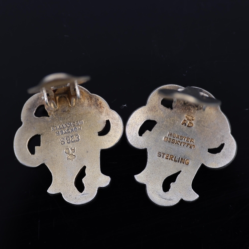 1477 - A DRAGSTED - a pair of Danish silver-gilt white enamel 'Monster Beskyttet' clip-on earrings, 21.7mm,... 