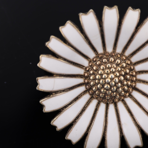 1479 - ANTON MICHELSEN - a Danish vermeil sterling silver and white enamel daisy pattern brooch, 32.5mm, 9.... 