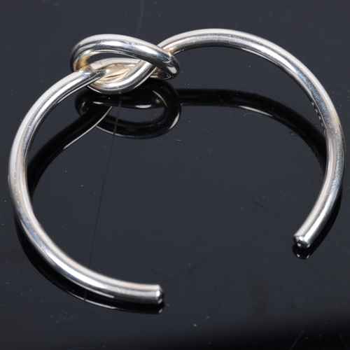 1481 - GEORG JENSEN - a Danish modernist sterling silver Love Knot cuff bangle, model no. A44B, knot height... 