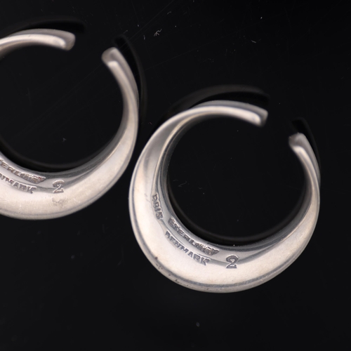 1482 - PALLE BISGAARD - a pair of Danish modernist sterling silver ear cuffs, plain circular concave form, ... 