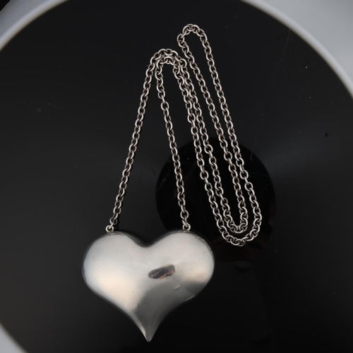 1489 - A large Danish modernist stylised heart pendant necklace, with integral cable link chain, apparently... 