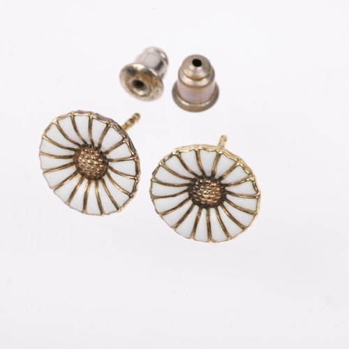 1498 - GEORG JENSEN - a pair of Danish modernist sterling silver-gilt white enamel daisy pattern earrings, ... 