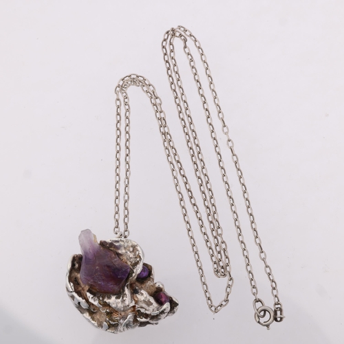 1505 - A Danish brutalist amethyst crystal and pearl abstract pendant necklace, apparently unmarked, on sil... 