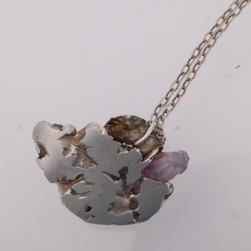 1505 - A Danish brutalist amethyst crystal and pearl abstract pendant necklace, apparently unmarked, on sil... 