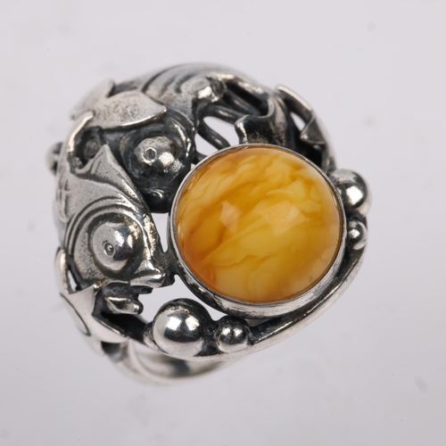 1506 - NIELS ERIK FROM - an Art Nouveau style Danish sterling silver and butterscotch amber fish openwork r... 