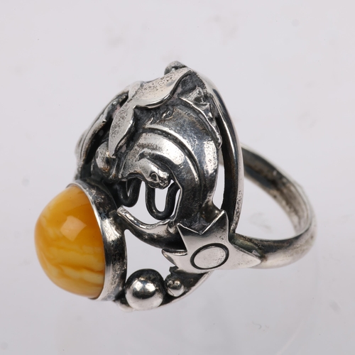 1506 - NIELS ERIK FROM - an Art Nouveau style Danish sterling silver and butterscotch amber fish openwork r... 