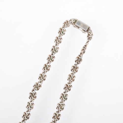 1507 - BERNHARD HERTZ - a Danish silver graduated knot collar necklace, 38cm, 31.4g