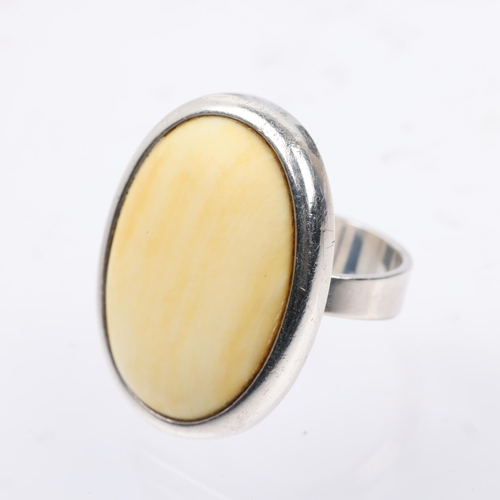 1516 - NIELS ERIK FROM - a Danish modernist sterling silver marine ivory dress ring, setting height 28.7mm,... 